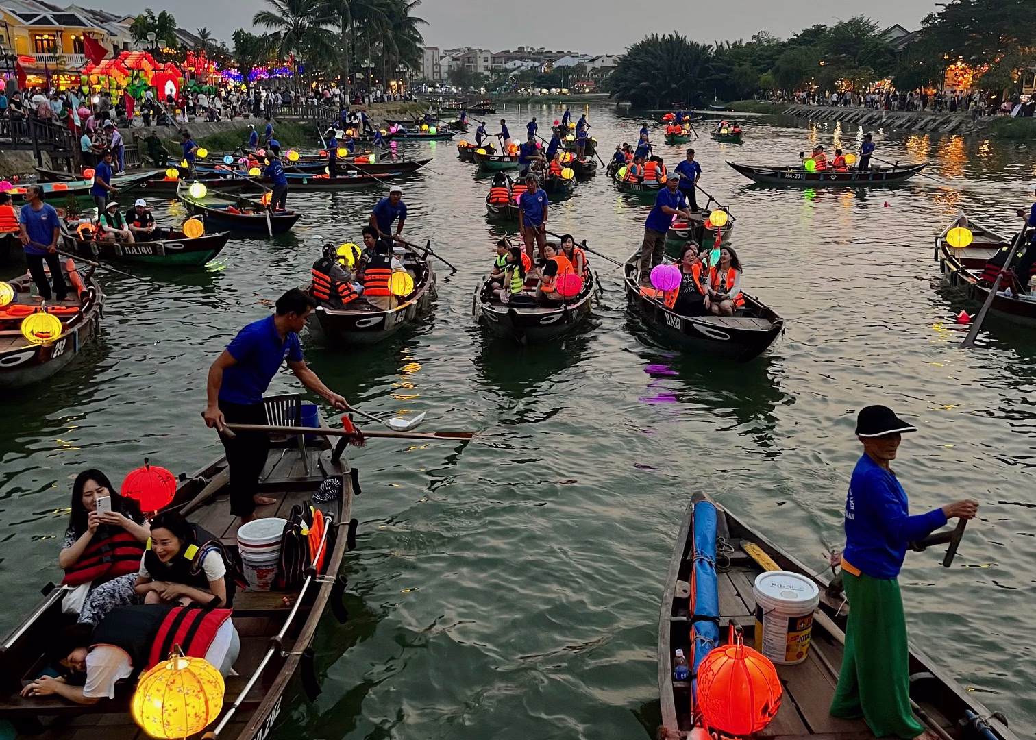4 Week Vietnam Itinerary: Laid-Back Adventures on a Budget 1 Boats on the river with colorful lanterns in Hoi An, a stop on a one month Vietnam itinerary