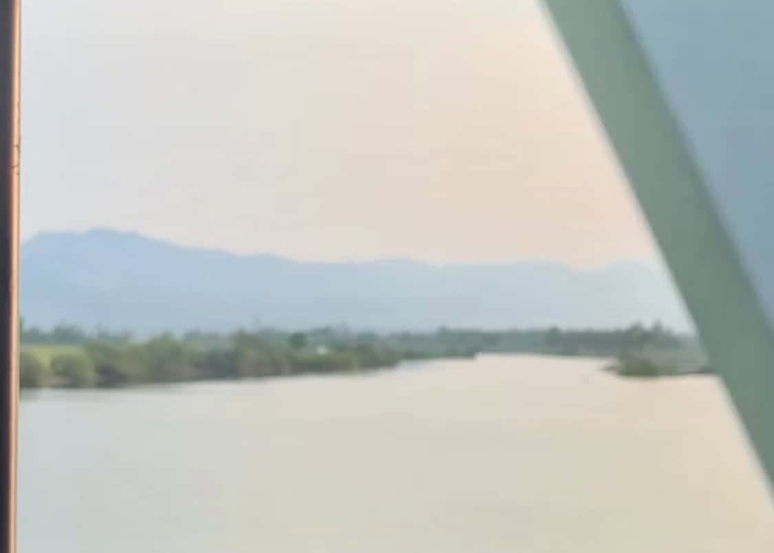 Overnight Sleeper Train in Vietnam: A Guide for First-Timers 6 The views of mountains in the Vietnamese countryside from an overnight sleeper train in Vietnam.