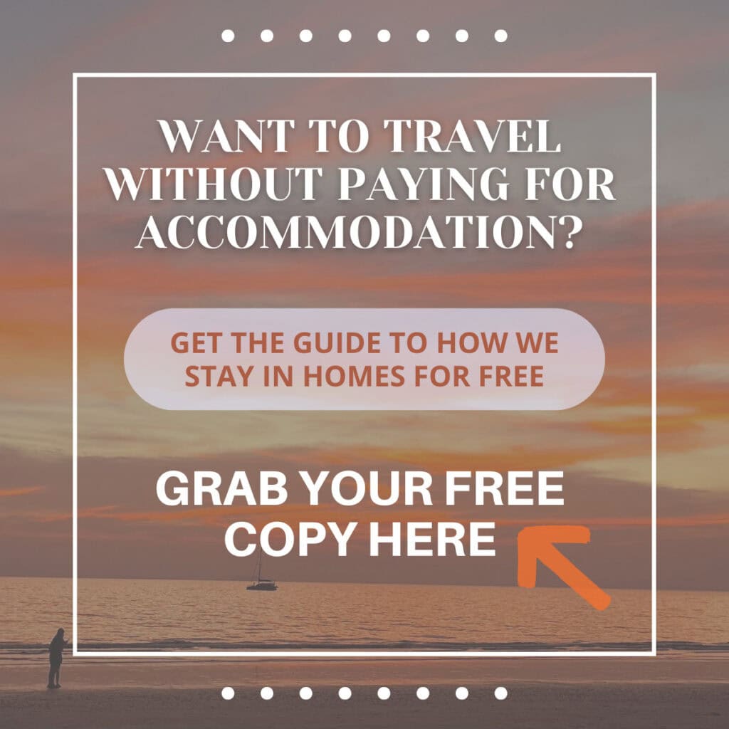 An image of a pink, purple, and orange sunset on the beach in Ao Nang is overlayed by text reading Want to travel without paying for accommodation? Get the guide to how we stay in homes for free. Grab your copy here.