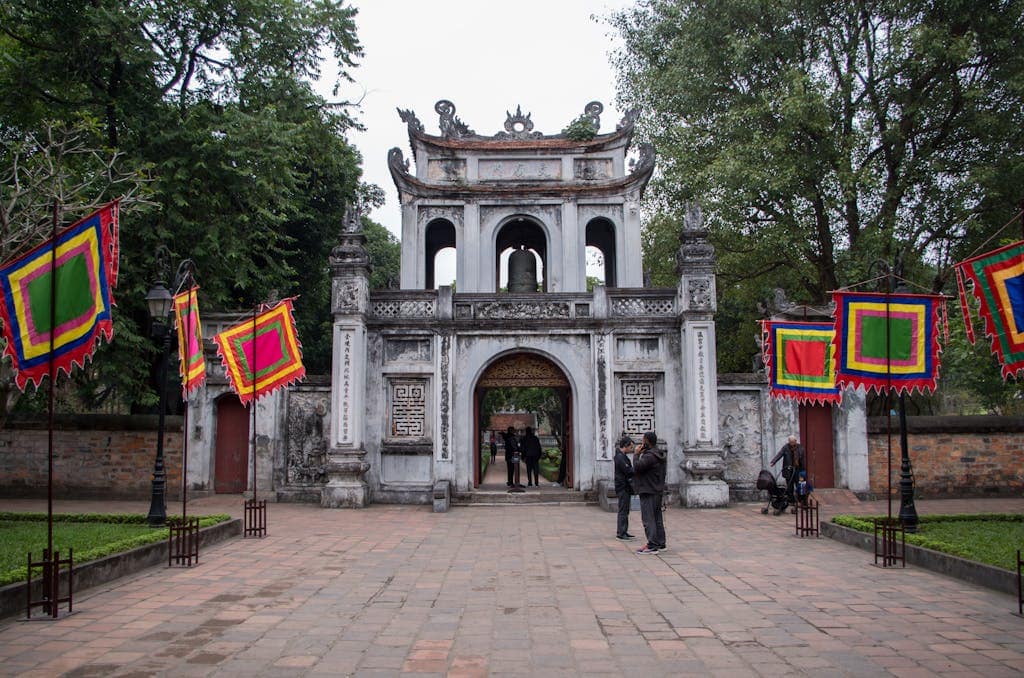 Where to Stay in Hanoi: Best Neighborhoods + Our Favorite Hotels 5 Explore the historic main gate at the Temple of Literature in Hanoi, Vietnam, showcasing ancient architecture and cultural significance.